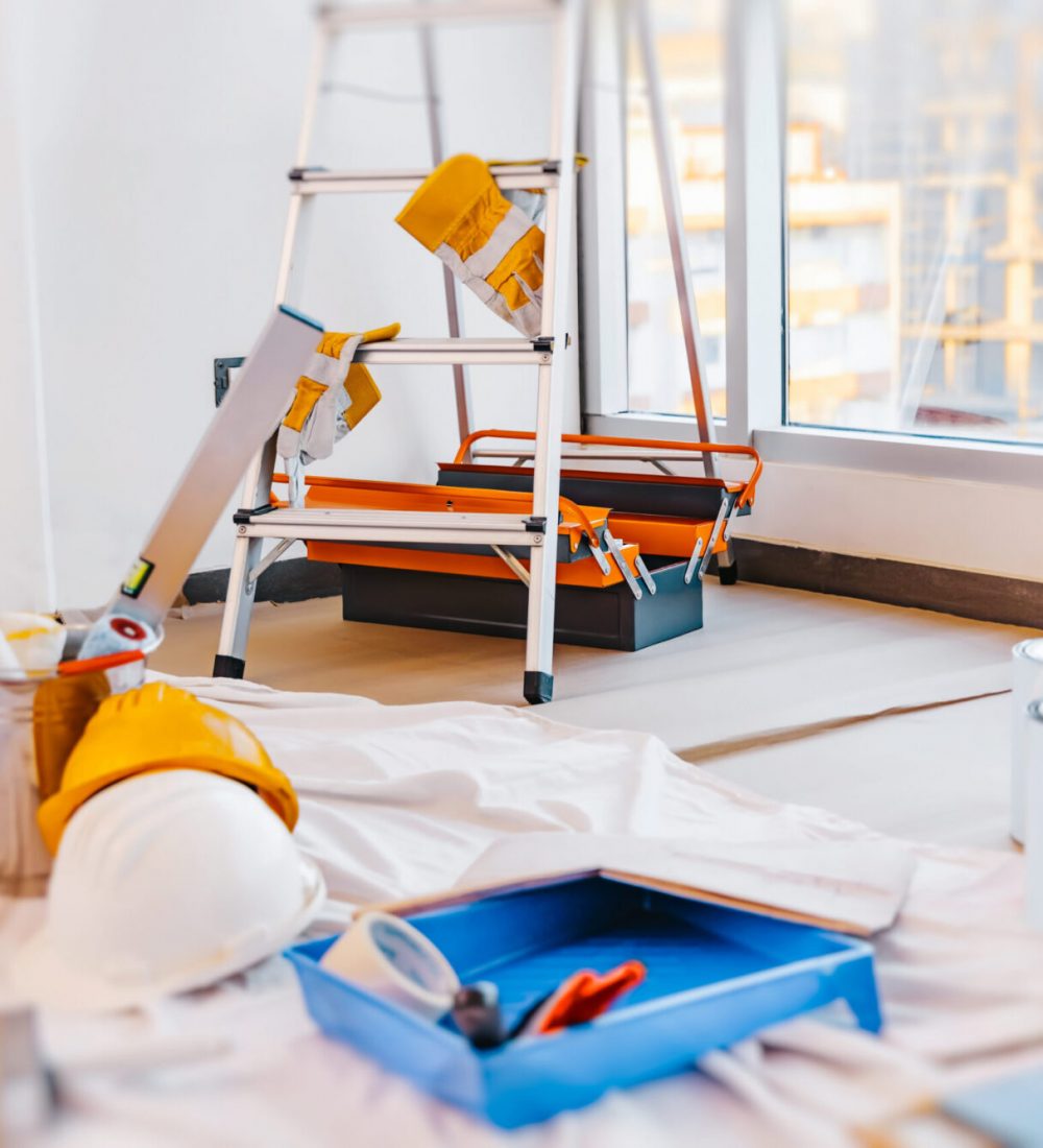 Still Life from Tools for Repair. Brush and Paint for Painting Walls, Ladder and Rulers. Decorative Renovation of a New Apartment.